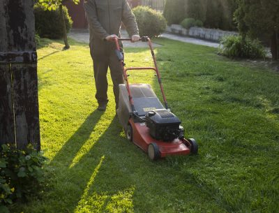 Man Mowing Grass